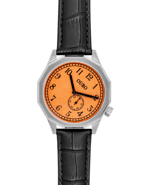 Driver’s watch OURO RW-003 boîtier dodécagonal (à 12 cotés) en acier avec cadran orange grainé décalé à 45° et bracelet cuir noir embossé crocodile.